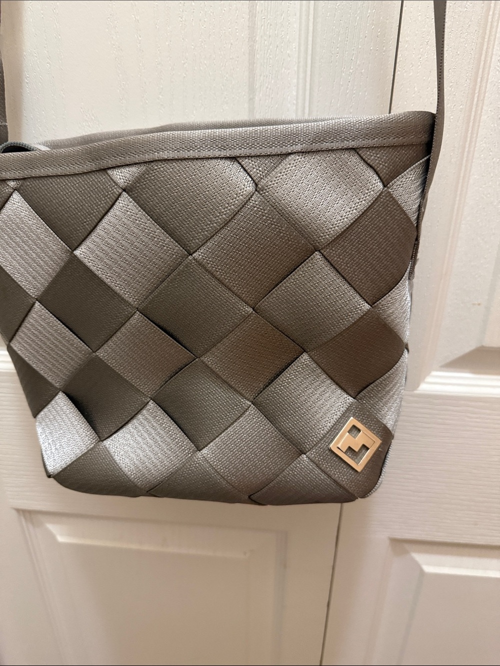 Woven Metallic Gray Crossbody Bag with Gold Logo Accent